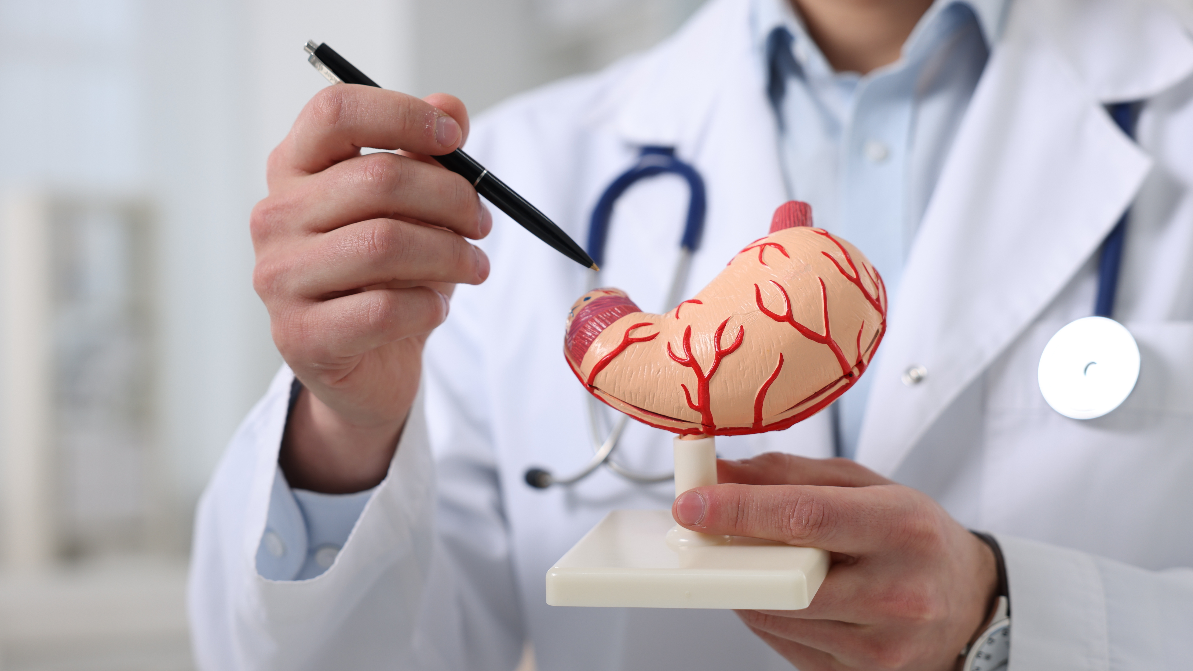 Healthcare marketing team analyzing campaign results targeting GI specialists