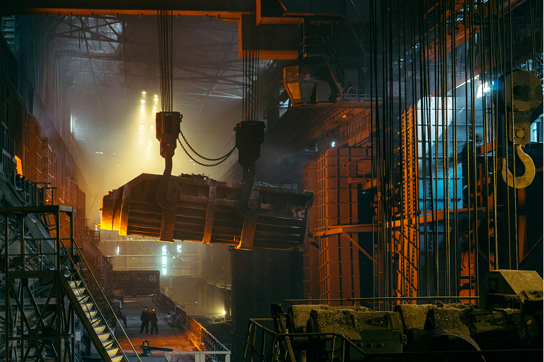 Business professional reviewing customized email lists for B2B lead generation in manufacturing